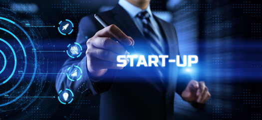 Startup new business idea. Businessman pressing button on screen.