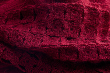 Color Knitting wool texture background. New 2023 trending PANTONE 18-1750 Viva Magenta color 