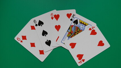 The combination of playing cards poker casino on game table.