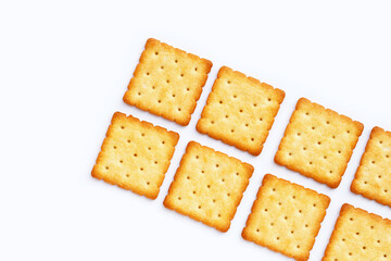 Dry cracker cookies on white background.