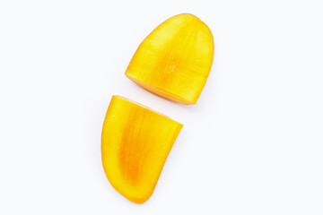 Mango fruit slices on white background.
