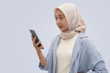 Hijab model, Islamic, with a variety of interesting poses, suitable for advertising needs and the like, with a plain background.  