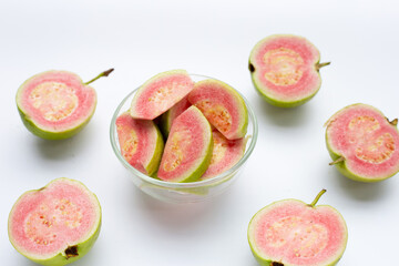 Fresh pink guava on white background.