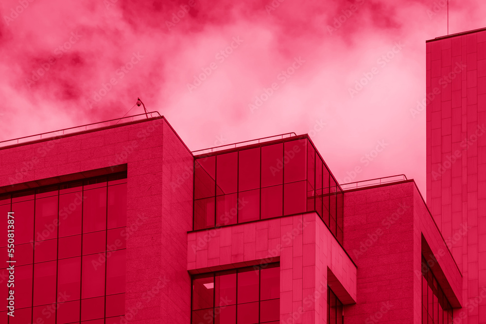 Poster abstract modern business architecture. image toned in color of year 2023 viva magenta. fragment of m