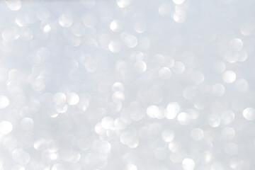 Abstract silver glitter bokeh background, season and festive season background