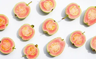 Fresh pink guava on white background.