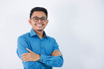 smile or happy asian businessman with glasses crossed arms and looking camera wearing blue shirt isolated on white background