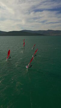 Aerial drone footage of a windsurfers surfing the Mediterranean sea of Urla Izmir. High quality footage
