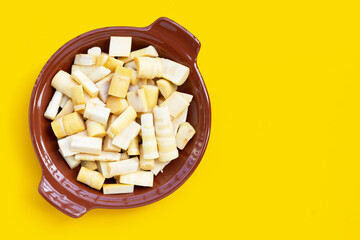 Bamboo shoots on yellow background.