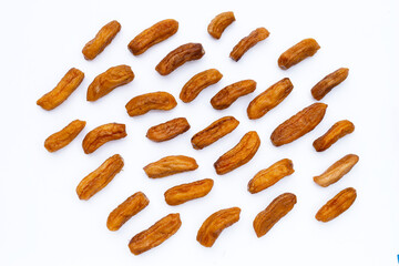 Sun-dried bananas on white background.