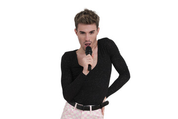 Young caucasian man singing with a microphone. Isolated over white background.