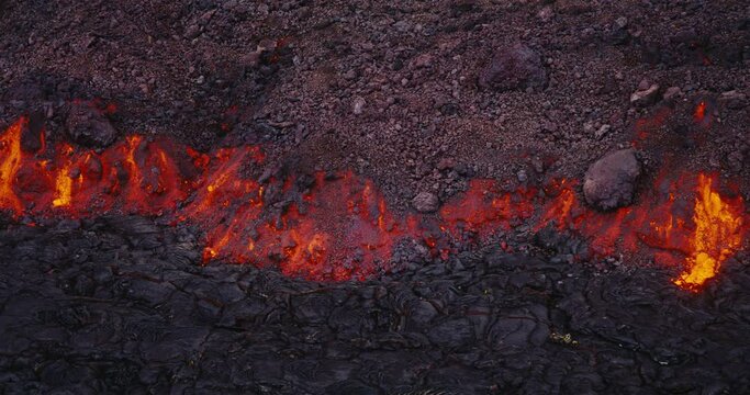 Lava flow from the Hawaii Mauna Loa volcano eruption of 2022, Hot lava and magma flowing down the mountain,  Shot on RED