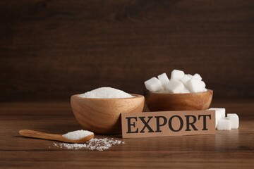 Card with word Export and sugar on wooden table, space for text