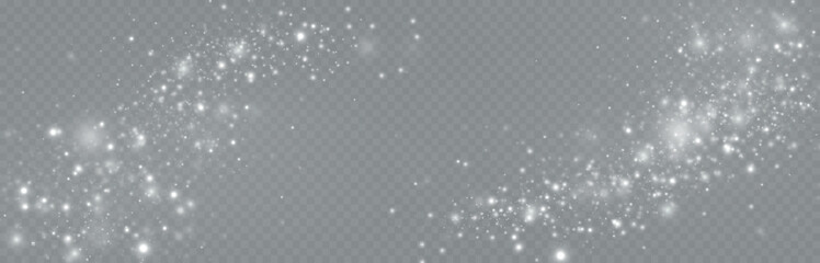 Particles of white magic dust. Shining light particles.Christmas glitter particles. Light effect on a transparent background