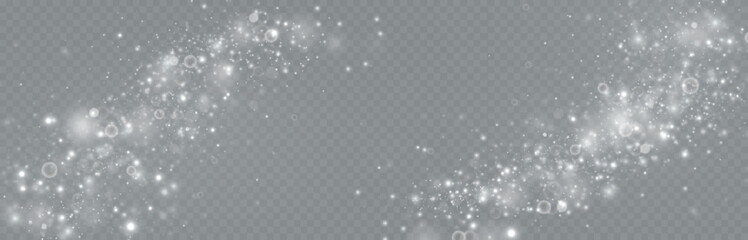 Particles of white magic dust. Shining light particles.Christmas glitter particles. Light effect on a transparent background