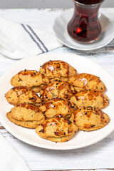 Cheese cookies. Sesame and cheese cookies on wood floor background. close up