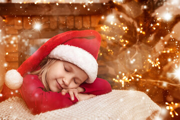 Christmas Girl Child in Red Santa Hat Sleeping when Waiting for Santa Claus on Bright Christmas Home Atmosphere Background with Lights.