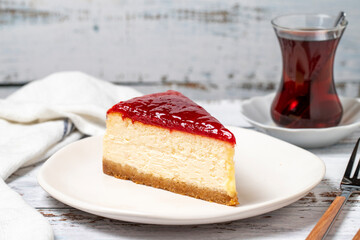 Cheesecake. New York cake. Raspberry cheesecake on wood floor background. close up