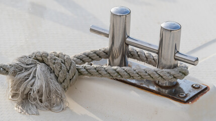 metallic pulley block and ropes on the deck