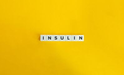 Insulin Word on Letter Tiles on Yellow Background. Minimal Aesthetics.