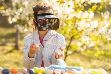 teenage girl with easter egg in virtual glasses