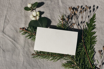 Blank textured business card mockup template. Christmas stationery, branding. Spruce, cypress tree...