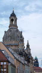Fototapeta na wymiar Frauenkirche and modern facades in Dresden Germany during summer
