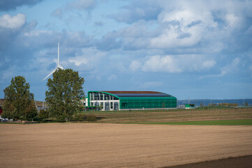 Tram garage and wind power plant in rural area outside Lund Sweden