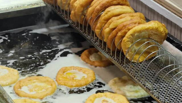 Traditional Hungarian street food Langos at fair