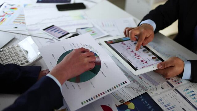 Person analyzing financial statements of a business.