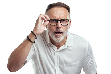 PNG studio portrait of a mature man wearing spectacles and looking confused against a grey background - obrazy, fototapety, plakaty