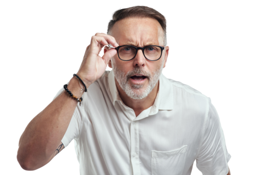 PNG studio portrait of a mature man wearing spectacles and looking confused against a grey background