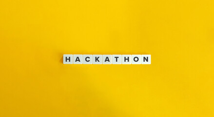 Hackathon Word on Letter Tiles on Yellow Background. Minimal Aesthetics.