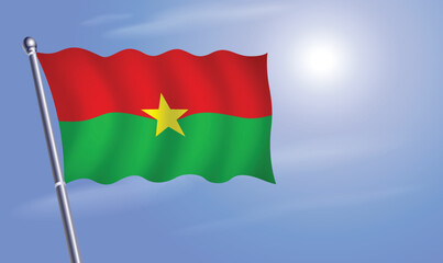 Burkina flag against a blue sky