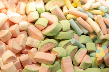 close-up rainbow colorful machmallows blackground