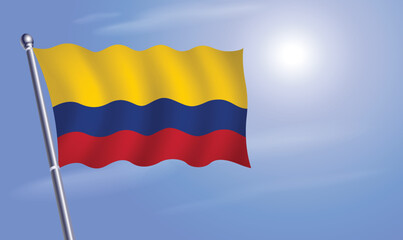 Colombia flag against a blue sky