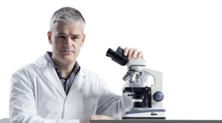 Medical scientist posing with a microscope