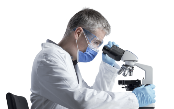Scientist analyzing samples under the microscope