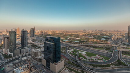 Naklejka na ściany i meble Panorama showing Dubai marina and JLT skyscrapers along Sheikh Zayed Road aerial timelapse.
