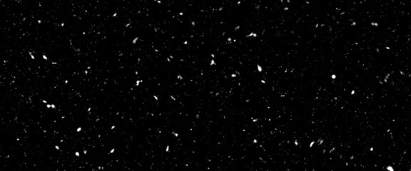 Naklejka na ściany i meble Different realistic falling snow or snowflakes. Falling snow isolated on black background. Winter snowfall illustration. Bokeh lights on black background, flying snowflakes in the air. Snow at night.