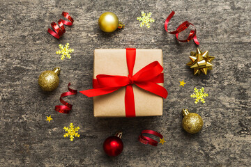 Top view Flat lay Christmas decorations and gift box on colored background with copy space. Christmas or Happy New Year composition