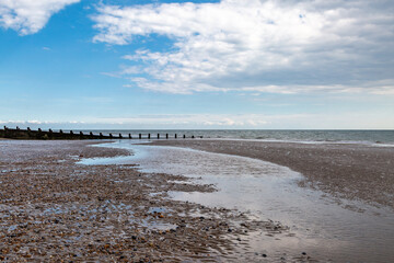 A view over the beach near Camber Sands with an outgoing tide