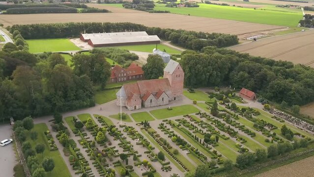 Lutherian Middle Age Church, Graveyard and Closter in Denmark - Aerial Drone Orbital Shot