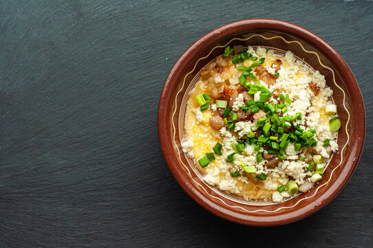 national traditional Ukrainian dish made from corn grits banosh with lard crackers and bryndza food of countries of the world gastrotourism Hutsul cuisine of the Carpathians