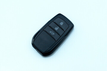 Obraz premium Car key on the colorful background. Wireless remote control system.