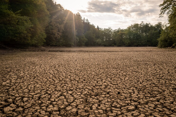 Dry mountain river bed in the forest, during the hot summer season, devastating effects for the...