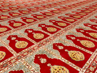 red muslim carpet texture