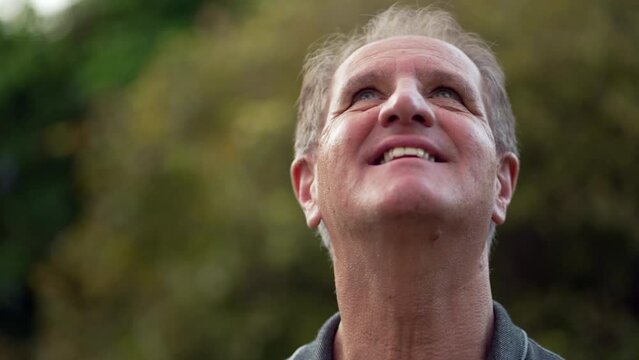 Spiritual middle aged man having HOPE