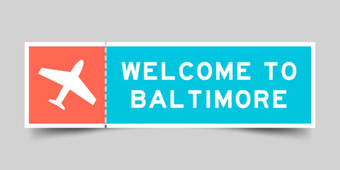 Orange and blue color ticket with plane icon and word welcome to baltimore on gray background