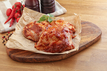 Marinated chicken leg in tomato sauce